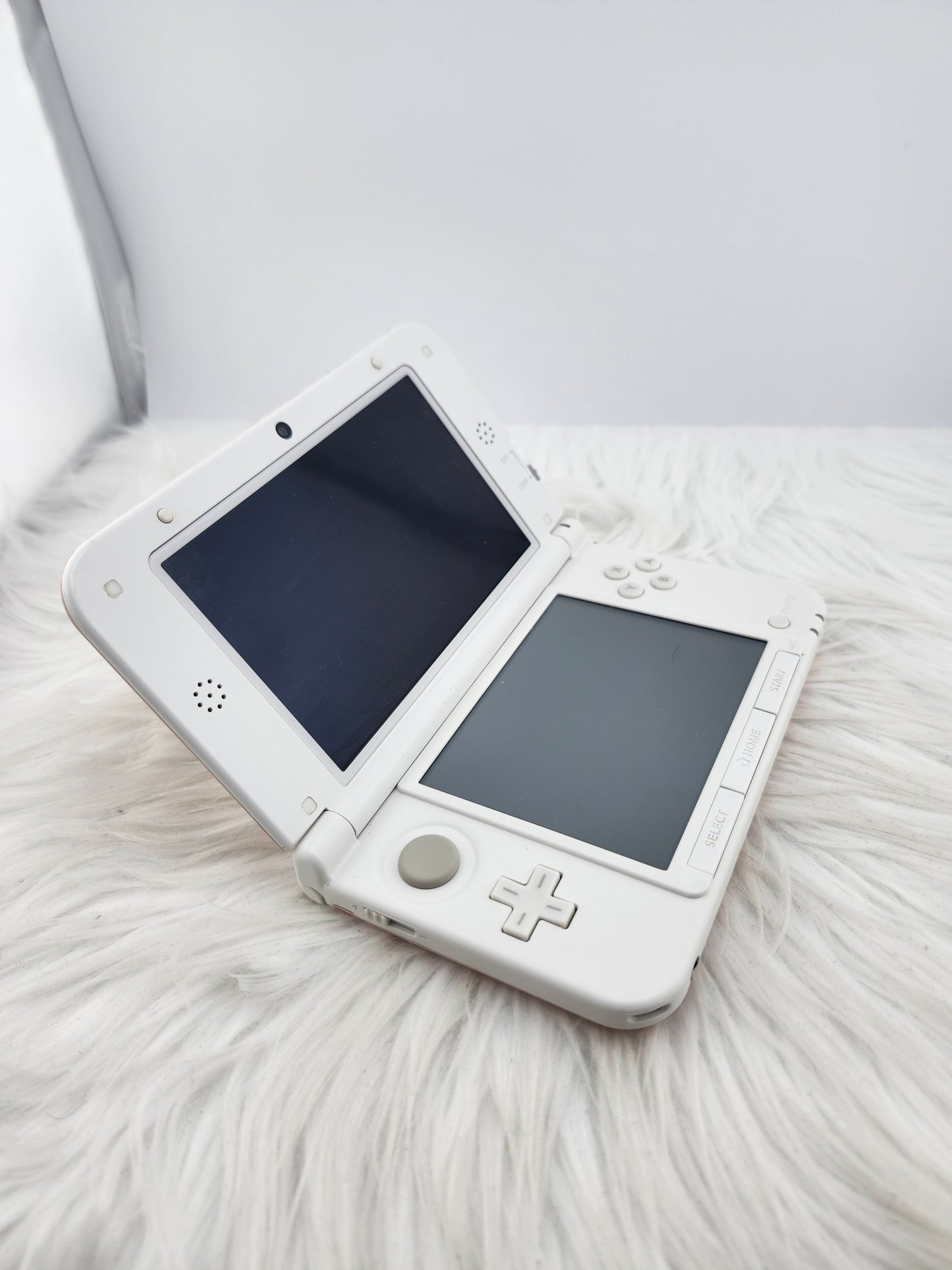 3DS XL rosa y blanca