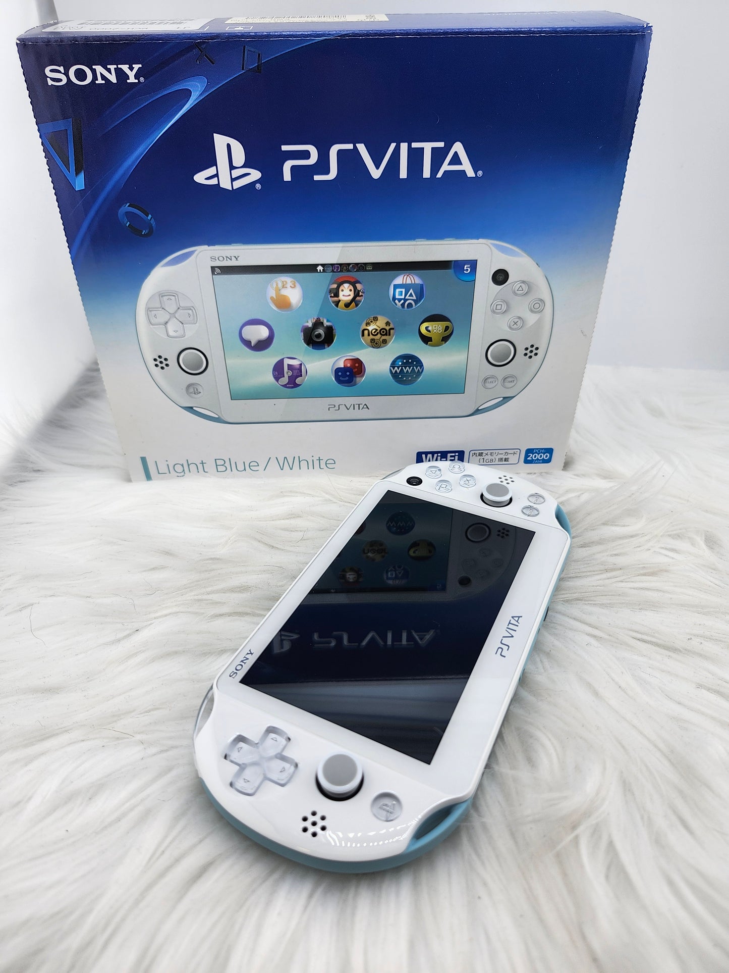 PS Vita 2000 rosa - completo en caja