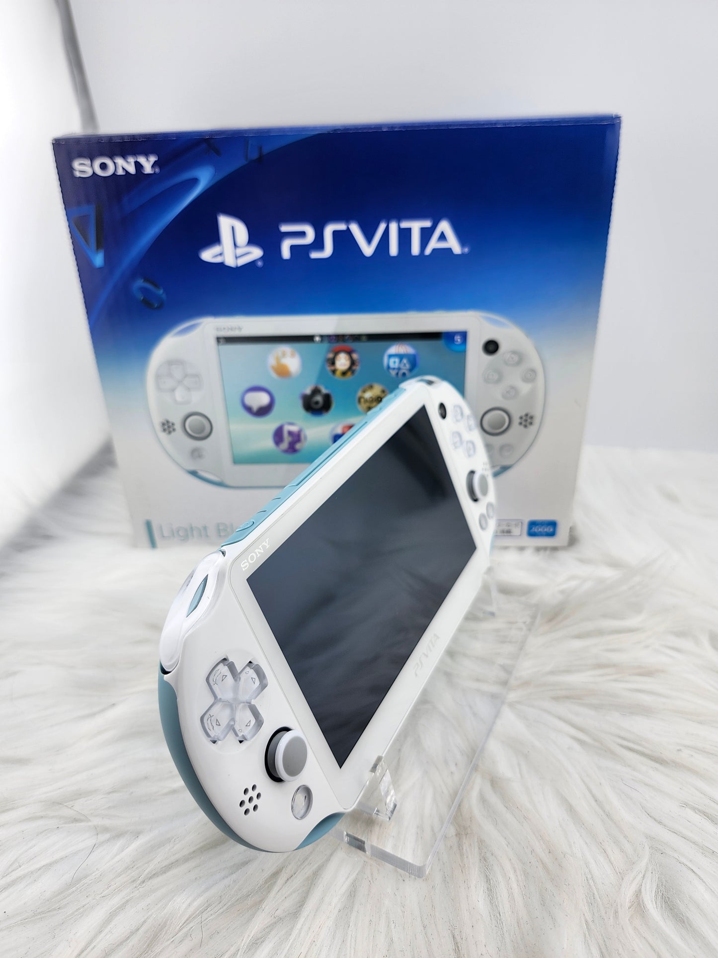 PS Vita 2000 rosa - completo en caja