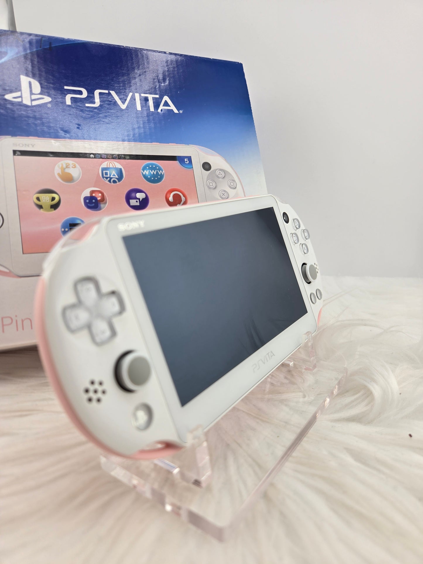 PS Vita 2000 rosa - completo en caja