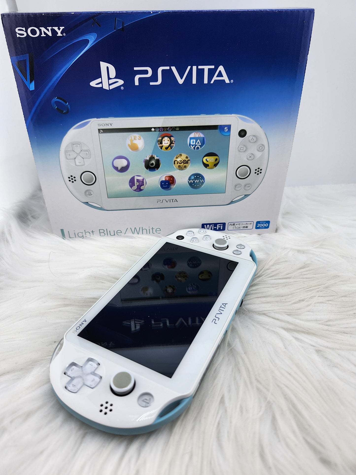 PS Vita 2000 rosa - completo en caja