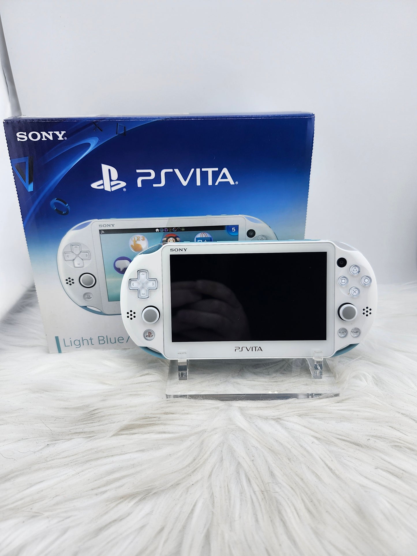 PS Vita 2000 rosa - completo en caja