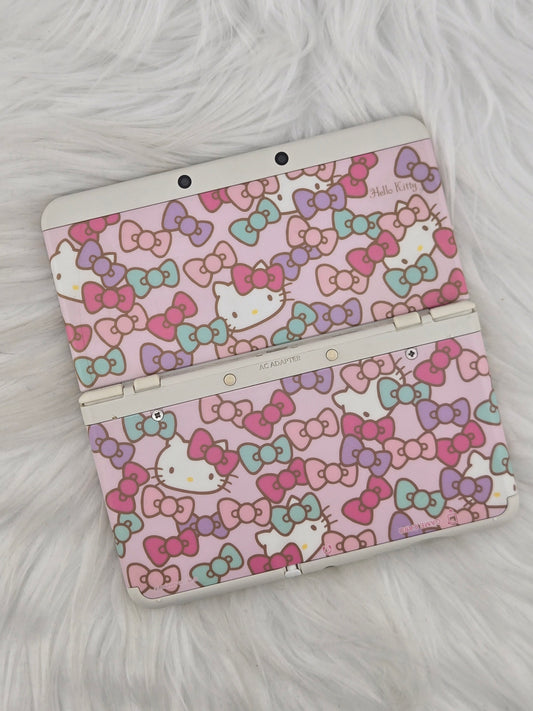 New 3ds blanche avec plaques Hello Kitty
