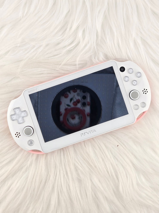 PS Vita 2000 rose - complète en boîte