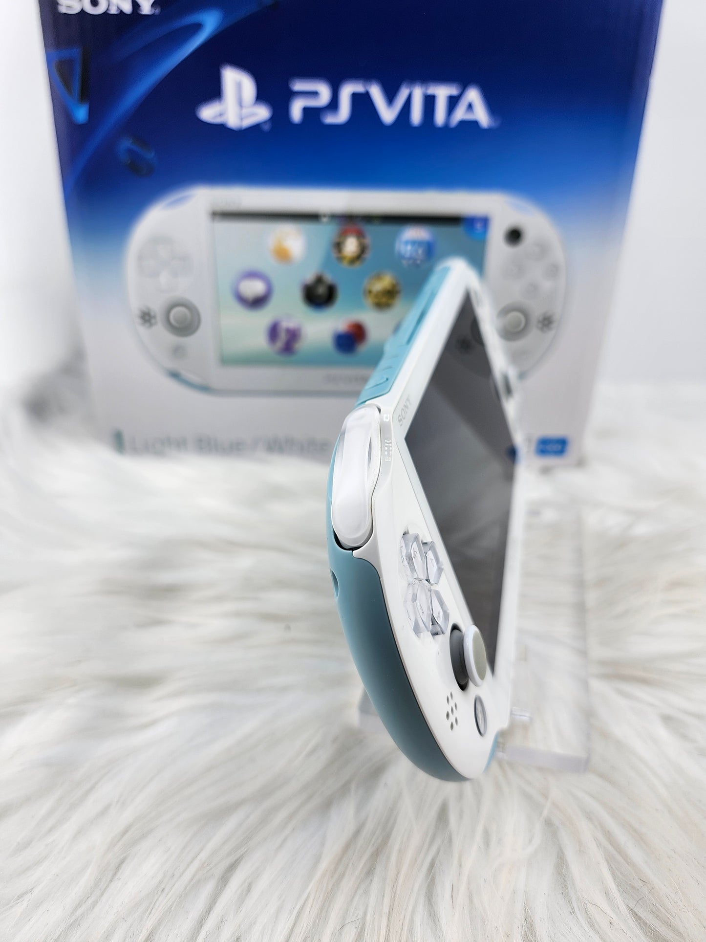 PS Vita 2000 rosa - completo en caja