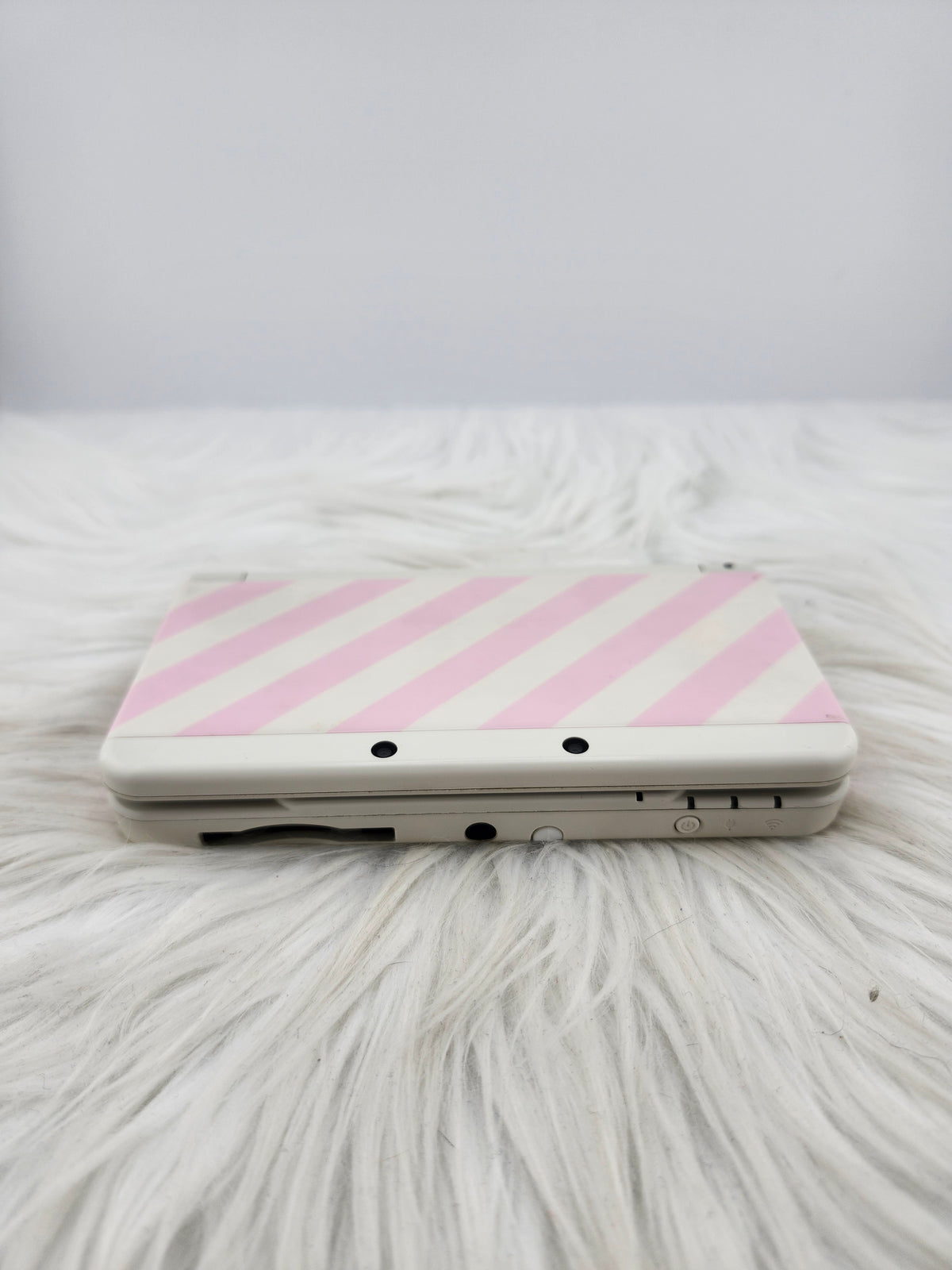 New 3ds con carcasas de rayas rosas y blancas