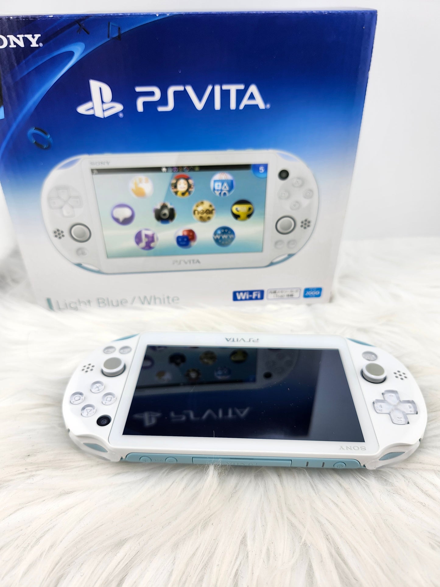 PS Vita 2000 rosa - completo en caja