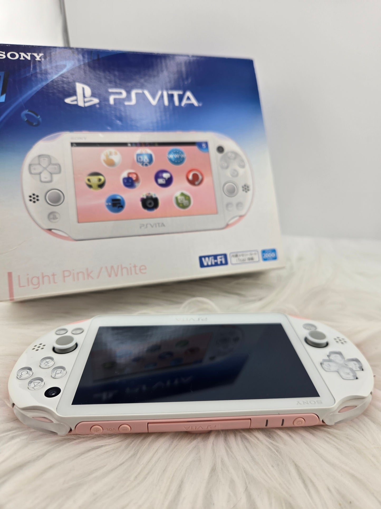PS Vita 2000 rosa - completo en caja