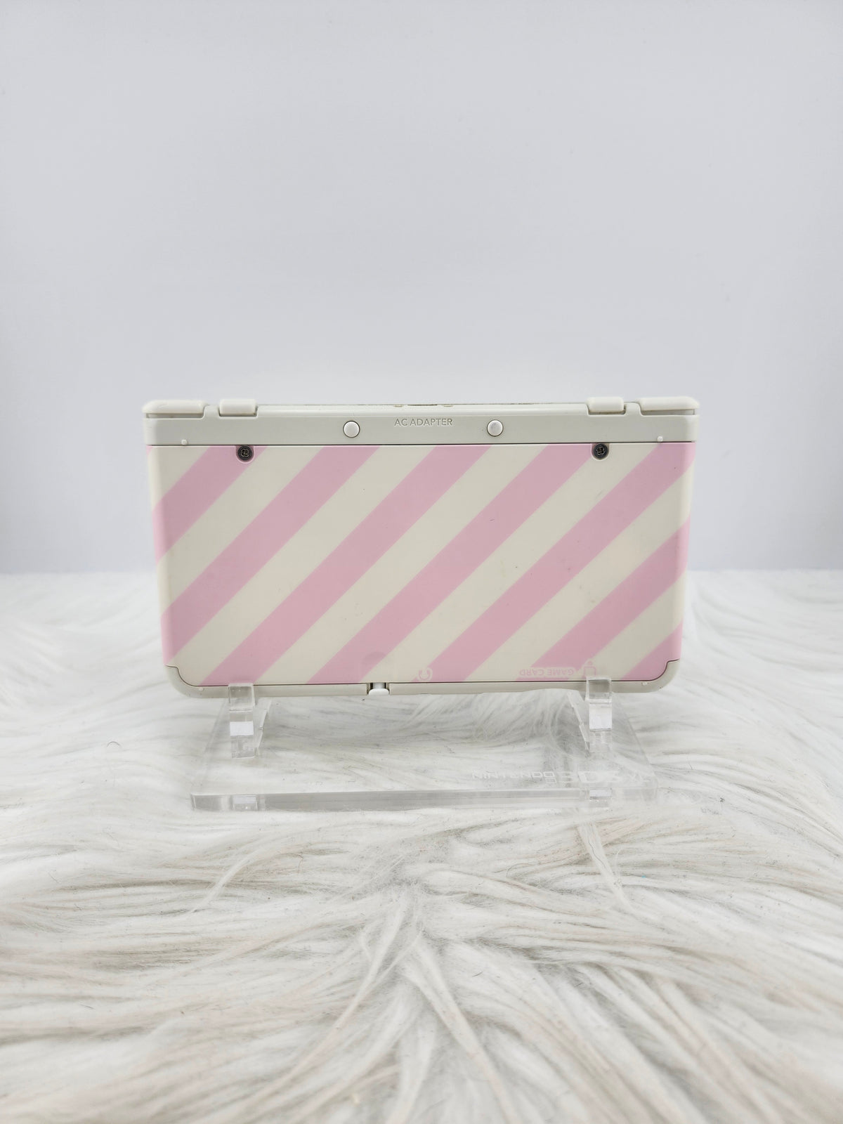 New 3ds con carcasas de rayas rosas y blancas