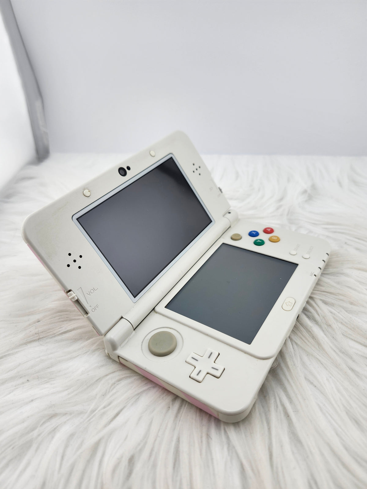 New 3ds con carcasas de rayas rosas y blancas